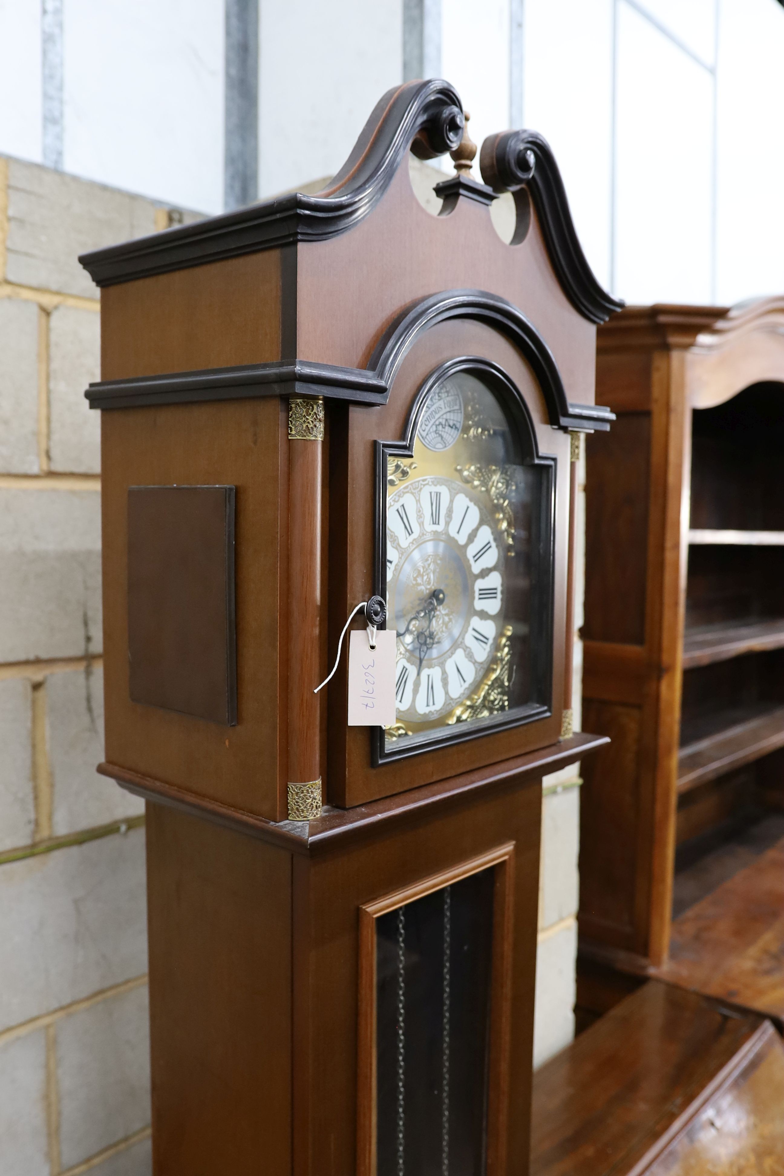 A reproduction German mahogany 'Tempus Fugit' longcase clock, height 215cm